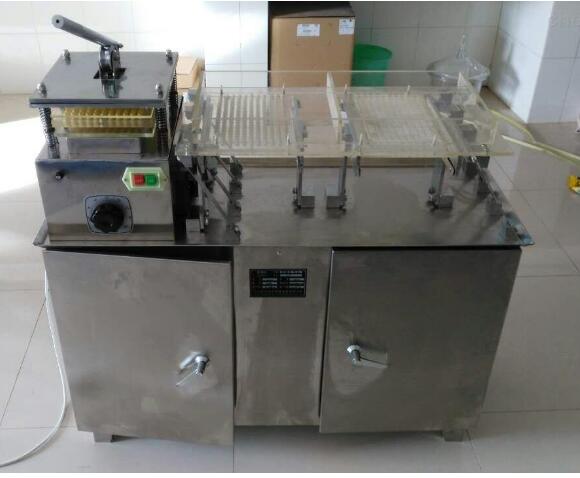 中（zhōng）藥粉膠囊填充機